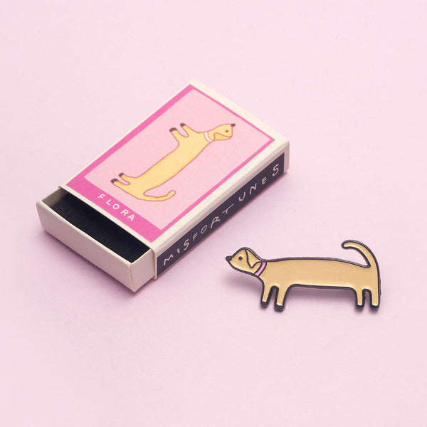 Flora the winnerdog pin